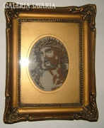 Jesus needle tapestry in blonde frame.