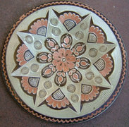 Richly decorated copper wall plate