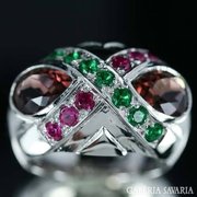 54 And genuine garnet and zirconia marked 925 silver on the ring