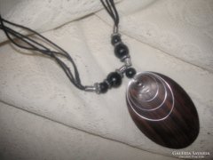 Necklace metal, wood, leather, the pendant is made of beautiful veined ebony wood