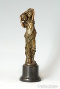Korsós nőalak bronz szobor