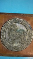 Marked bronze plaque from 1976 with a picture of a Puli dog