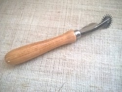 Old leather rádli with wooden handle