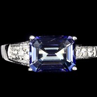 Gyönyörű valódi lila kék Tanzanit 925 ezüst gyűrű cirkónia kísérővel 14 karátos fehér aranyozással .