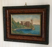 A very old tapestry depicts the Miramare castle in Trieste in a beautiful frame.