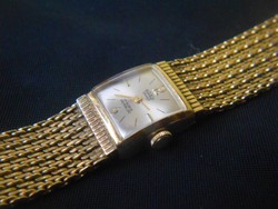 Arany bevonatú Roxy svájci antik ékszer óra.Működik.