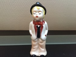 Old porcelain boy figure