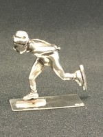 Ezüst miniatűr korcsolyázó