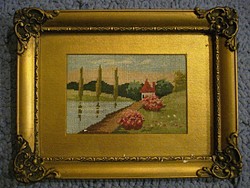 2 needle tapestries depicting a waterfront landscape in a blond frame