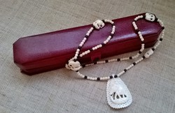 Old carved bone necklace