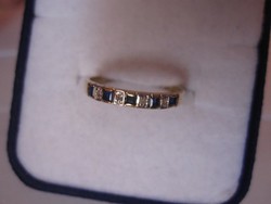 Tömör arany gyűrű kék zafír és brill csiszolású gyémánt kővel