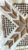 Beautiful decorative cushion cover with cut-out embroidery, tablecloth