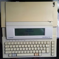 Canon star writer 30 electric and battery typewriter with new ink ribbon, with factory power supply