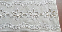 Large cushion cover decorated with a raw white embroidered stripe