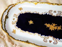 A richly gilded reichenbach echt cobalt porcelain bowl offering