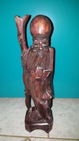 A stately statue of old wood carved 30cm