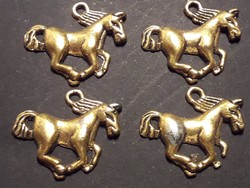 A metal pendant with a horse, a gift idea