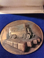 Bronze plaque - the work of András lapis - 75 years of Budapest bus transport, bkv