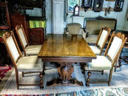 Antik faragott bővíthető étkező asztal 4 db L. F. Christensen székkel.