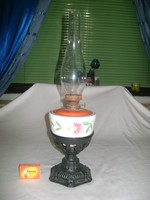 Antique table top kerosene lamp with pierced patterned cast iron base