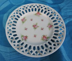 A small rose-painted bowl with an openwork basket pattern on the edge