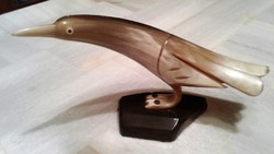 The bird made of Art Deco horn is 22 cm long