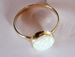 Női arany gyűrű opállal(14k) ezüst mánia részére 