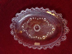 Glass serving bowl, oval shape, size 26 x 18 x 3 cm. He has!