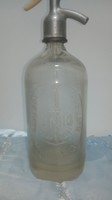 Old embossed soda bottle
