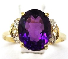 Tömör 10k arany gyémánt gyűrű viola-lila kővel