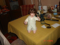 Kneeling porcelain doll / l.-03.22 /