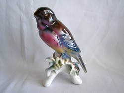 Nagyon szép, faágon ülő porcelán madár, jelzett Arpo