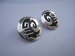 Large round silver earrings with Native American motif
