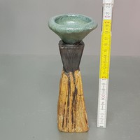 Craftsman with glazed ceramic spherical candlestick (1129)