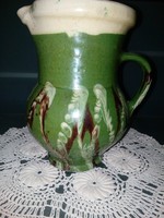 Old ceramic glazed jug