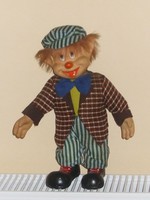 A clown with a porcelain head