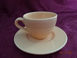 Italian quality porcelain, yellow tea cup + saucer. It is marked P. Jokai.