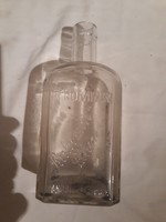 "RUKOMIN"likőre feliratú üveg