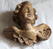 Wooden putto, angel head, hand carving