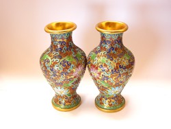 Gorgeous oriental compartment with enameled vase.