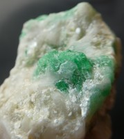 Natural beryl variant of emerald crystals in the calcite bedrock. 33 Grams.