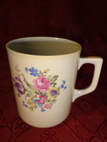 Zsolnay porcelain mug with a bouquet of spring flowers.