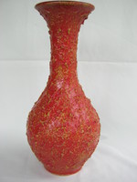 Craftsman in ceramic retro vase