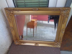 Mirror in wooden frame