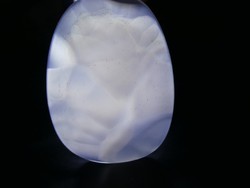 Natural, polished purple chalcedony mineral slice on all sides with a special internal pattern. 44G