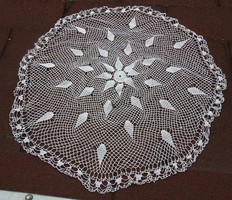 Hand crocheted round tablecloth