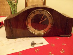 Antique beautiful sounding, striking, newly renovated antique fireplace clock