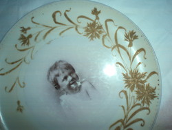 Antique thick-walled children's portrait porcelain wall plate