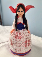 Charming baby in a lacy dress (23 cm)
