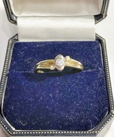 Pretty 14k gold ring with 3 pieces of zirconia stone